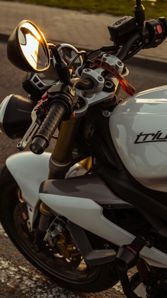 Close-up Triumph Motorcycle Sunset Ride 4K Mobile Wallpaper caught my eye for its quiet balance and soft depth. It feels made for a clean home screen.