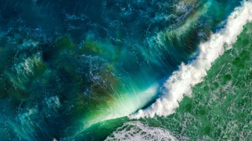 Aerial View of Turquoise Ocean Waves Breaking in Deep Blue Sea PC Wallpaper turns a simple moment into something cinematic. This one works especially well on a dark lock screen.