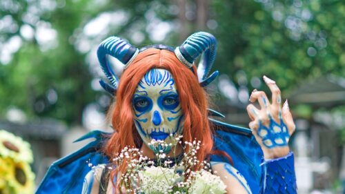 Fantasy Demon Woman with Blue Skull Makeup and Horns 4K Wallpaper