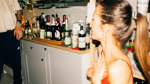 Intimate Party Atmosphere Kitchen Scene 4K Desktop Wallpaper