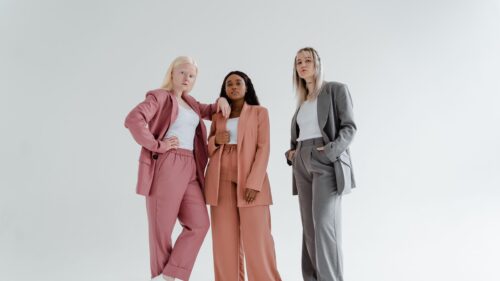 Fashionable Women in Business Suits Studio Portrait 4K Wallpaper