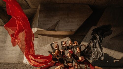 Dancers Performing with Red and Black Silk Fabric 4K Wallpaper