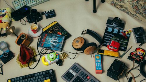 Creative Filmmaker Desk Setup with Retro Gear 4K Wallpaper