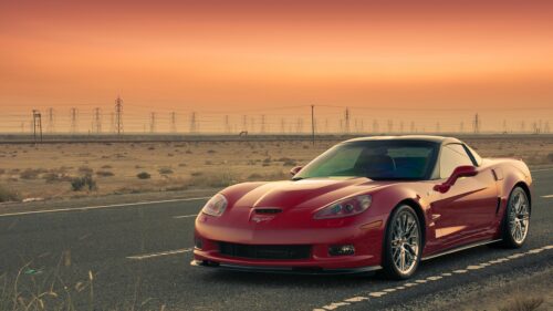 Red Corvette ZR1 Sports Car on Desert Road at Sunset PC Wallpaper