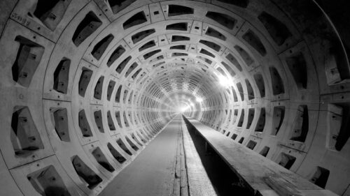 Stunning Black and White Concrete Tunnel Perspective 4K Wallpaper