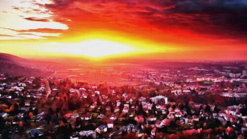 Stunning Aerial View of a Suburban Cityscape at Sunset 4K Wallpaper