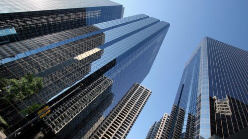 Low Angle View of Modern Glass Skyscrapers and City Architecture PC Wallpaper