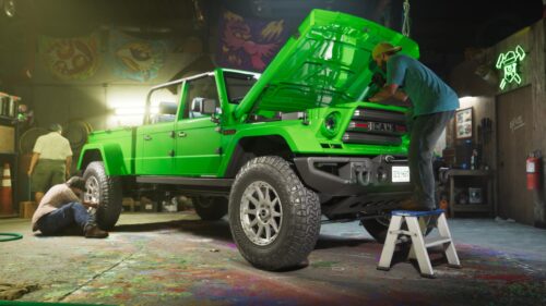 Bright Green Canis Off Road Truck in Auto Garage Desktop Wallpaper