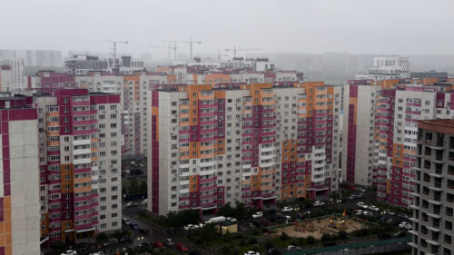 Modern Urban Residential District with Vibrant Apartment Blocks PC Wallpaper