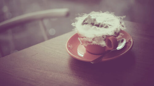Surreal Coffee Cup with Floating Clouds Artistic Desktop Wallpaper