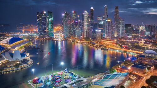 Breathtaking Singapore Skyline at Night Aerial View 4K Wallpaper