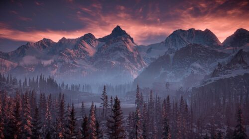 Stunning Snowy Mountain Range Under Crimson Sunset Sky 4K Wallpaper
