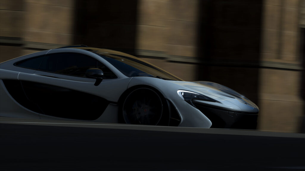 White McLaren P1 Speeding Through City Streets 4K Desktop Wallpaper