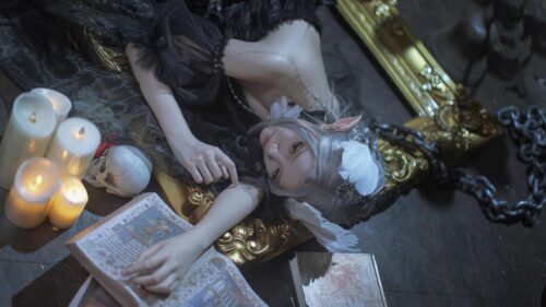 Gothic Elf Girl with Candles and Vintage Books Desktop Wallpaper