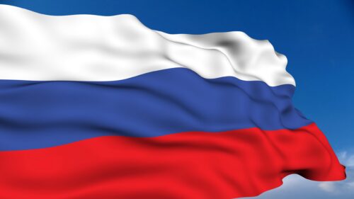 Waving Russian Flag Against a Bright Blue Sky Desktop Wallpaper