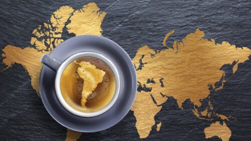 Coffee Cup with South America Map on Golden World Map Background PC Wallpaper