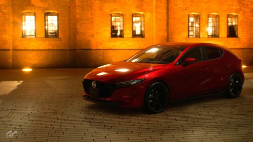 Stunning Red Mazda3 Hatchback Parked at Night 4K PC Wallpaper