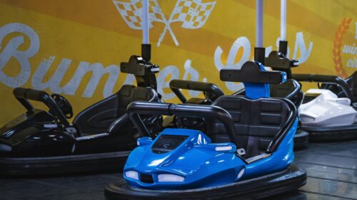 Blue Bumper Car in Amusement Park Fun Ride 4K Wallpaper