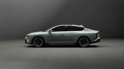 Sleek Kia K4 Sedan Studio Profile 4K Desktop Wallpaper