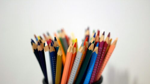 Colorful Sharp Pencils in a Holder Close-up 4K Desktop Wallpaper