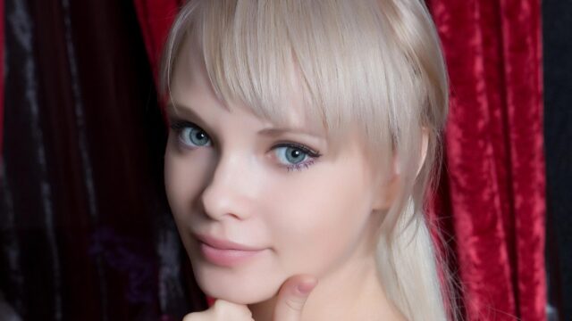 Stunning Portrait of a Beautiful Blonde Woman with Blue Eyes PC Wallpaper