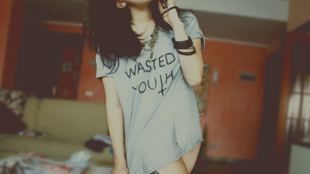 Stylish Girl Wearing Wasted Youth T-shirt Aesthetic Desktop Wallpaper