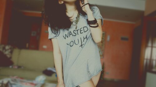 Stylish Girl Wearing Wasted Youth T-shirt Aesthetic Desktop Wallpaper