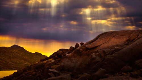 Dramatic Sunset Over Rocky Desert Landscape 4K PC Wallpaper
