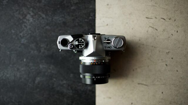 Vintage Olympus OM 2n Film Camera Top View Aesthetic PC Wallpaper