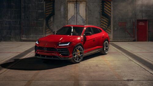 Stunning Red Lamborghini Urus SUV in Industrial Hangar 4K Wallpaper