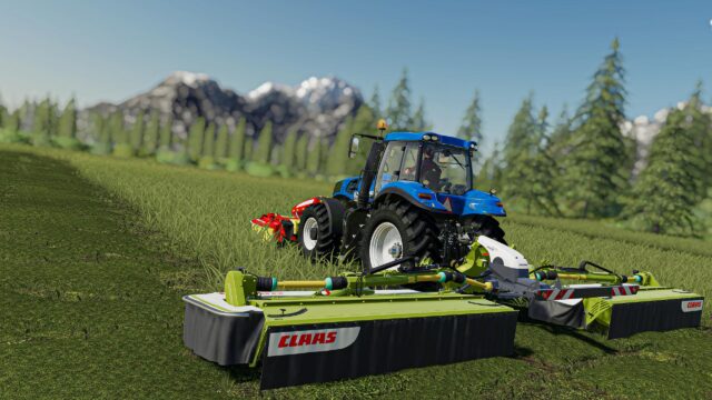 Blue Tractor Harvesting Green Grass in Mountain Field PC Wallpaper