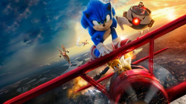 Sonic the Hedgehog and Tails Flying in Red Biplane Action 4K Wallpaper