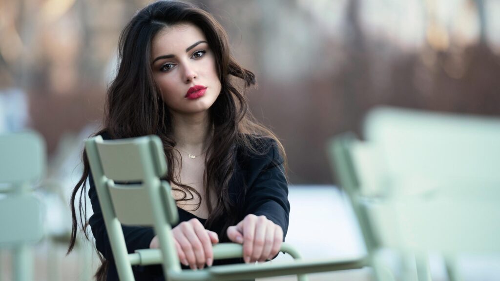 Stunning Portrait of a Beautiful Young Woman in Black Jacket 4K Wallpaper