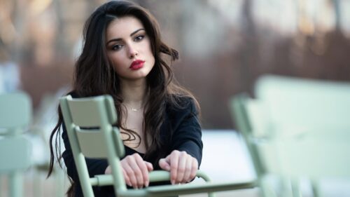 Stunning Portrait of a Beautiful Young Woman in Black Jacket 4K Wallpaper