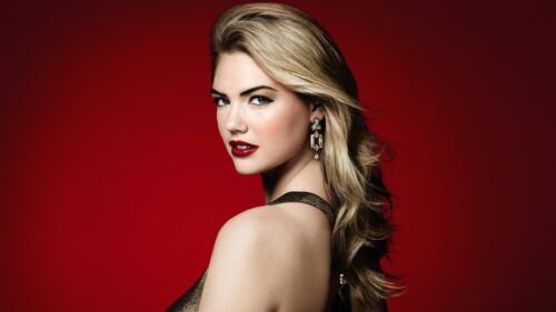 Stunning Kate Upton Portrait with Red Background Desktop Wallpaper