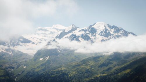 Majestic Snowy Alps Mountain Range Clouds 4K PC Wallpaper