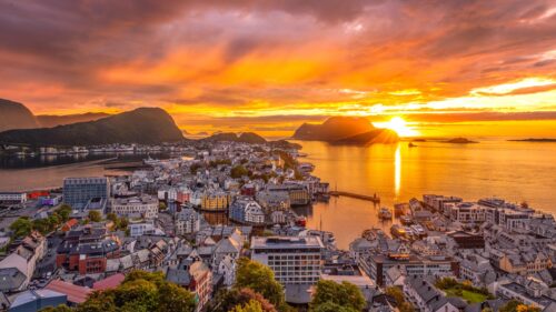 Breathtaking Alesund Norway Sunset Over Harbor Aerial View 4K Desktop Wallpaper