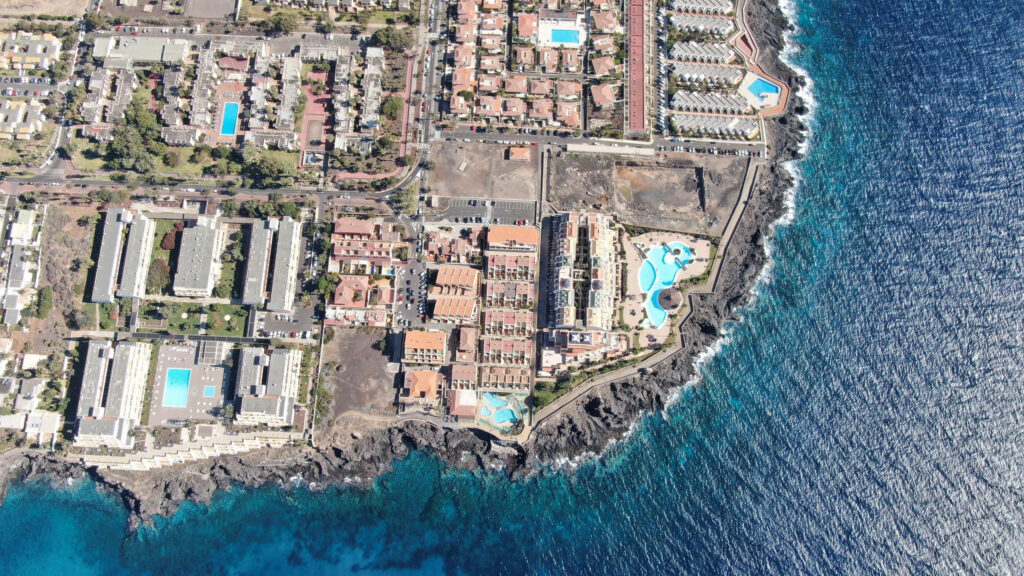 Aerial View of Coastal Mediterranean Resort Town Desktop Wallpaper