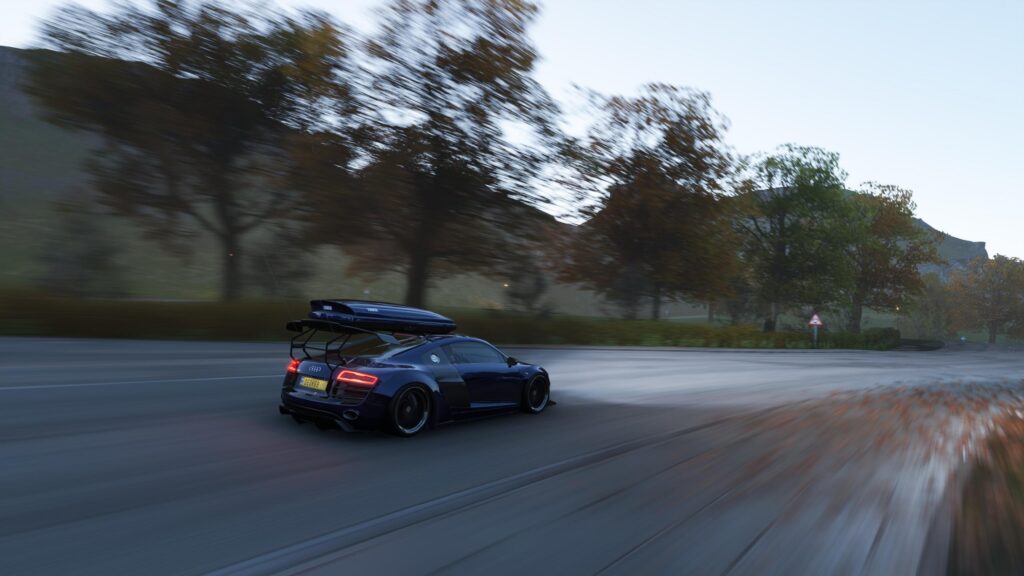 Audi R8 Racing Down a Scenic Country Road with Roof Box PC Wallpaper