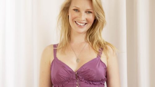 Smiling Blonde Woman in Purple Dress Portrait 4K Desktop Wallpaper