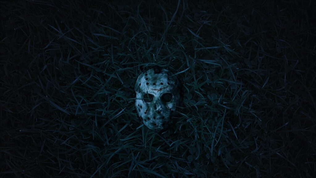 Jason Voorhees Hockey Mask in Dark Grass Horror PC Wallpaper