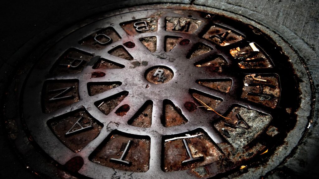 Industrial Rockstar Games Manhole Cover Aesthetic 4K Wallpaper