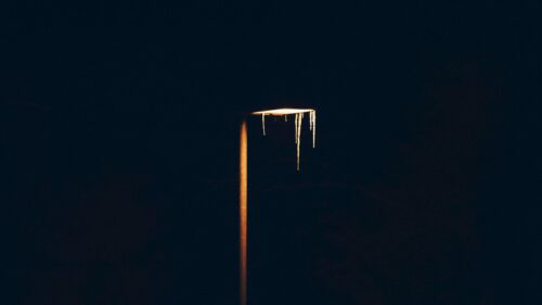 Minimalist Street Light with Icicles Against Dark Night Sky PC Wallpaper