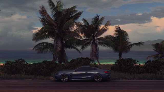 Sleek Dark Grey Luxury Sports Car at Tropical Beach Sunset PC Wallpaper