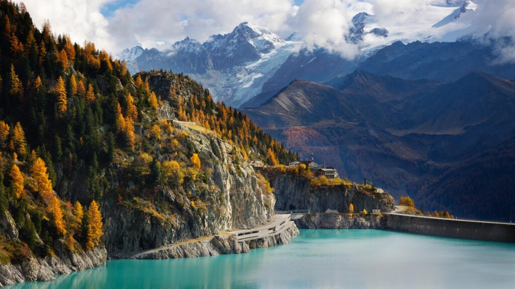 Breathtaking Swiss Alps Landscape with Turquoise Lake and Autumn Forest 4K Wallpaper