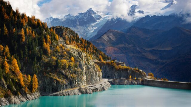 Breathtaking Swiss Alps Landscape with Turquoise Lake and Autumn Forest 4K Wallpaper