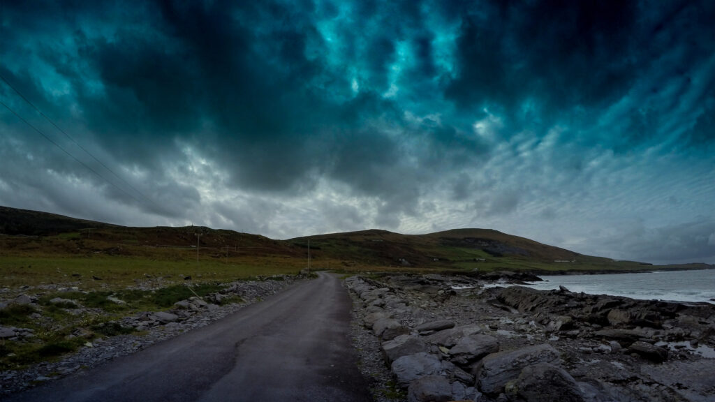Dramatic Stormy Coastal Road Landscape 4K Desktop Wallpaper