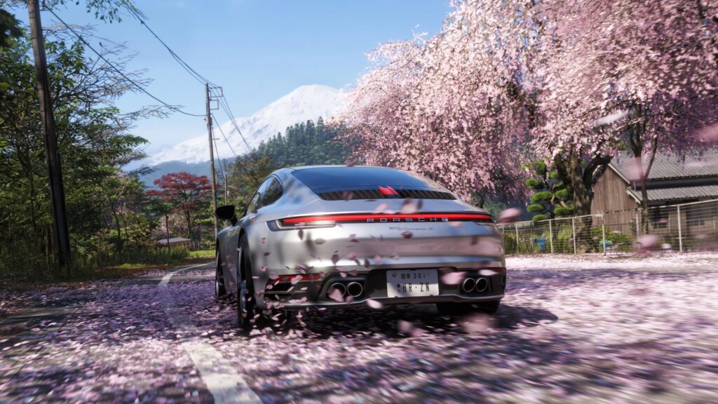 Silver Porsche 911 Carrera S in Japan Cherry Blossom Season 4K Wallpaper