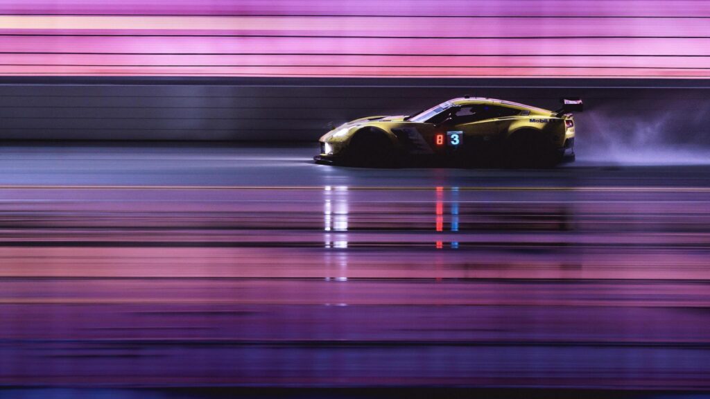 Yellow Corvette Racing Car Speeding on Night Track PC Wallpaper