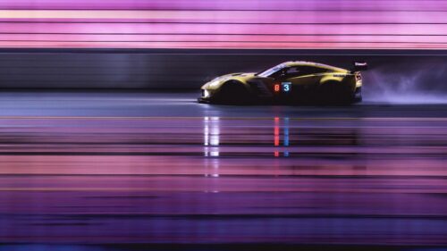 Yellow Corvette Racing Car Speeding on Night Track PC Wallpaper